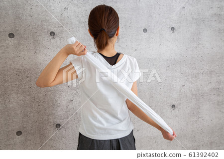 Stretch using towel 61392402