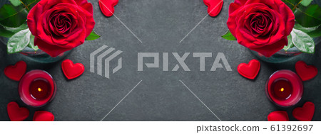 Valentines day concept. Red rose and candle on Valentines day concept. Red rose and candle on 61392697