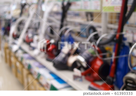 Vacuum cleaner section of a consumer electronics store Blur image Vacuum cleaner section of a consumer electronics store Blur image 61393333