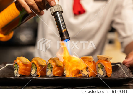 Chef cooking Salmon Foie gras roll, 61393413