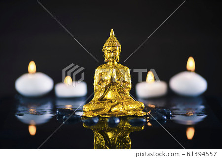 Gold buddha and black background 61394557