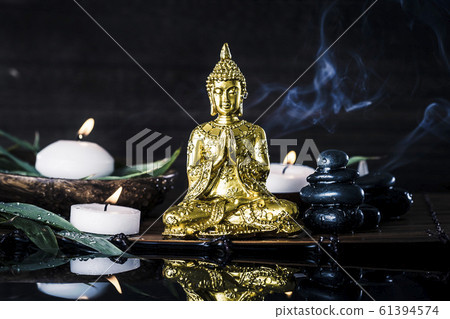 Gold buddha and black background 61394574