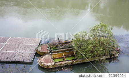 Scrapped barges in Rome on the Tiber Italy on Scrapped barges in Rome on the Tiber Italy on 61394934