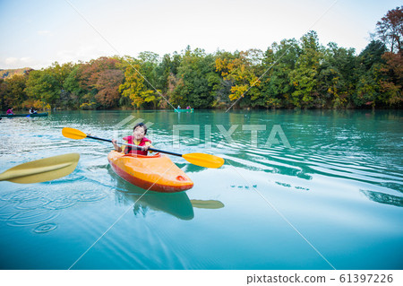 Children enjoying a canoe 61397226