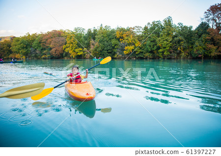 Children enjoying a canoe 61397227