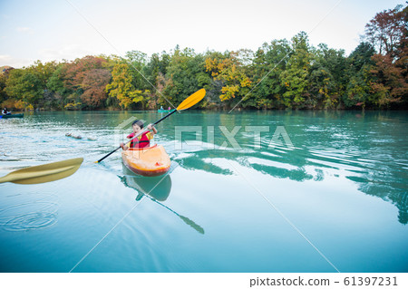 Children enjoying a canoe Children enjoying a canoe 61397231