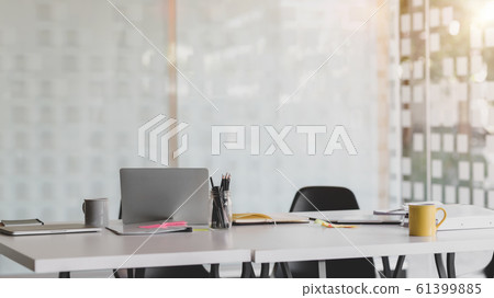 Cropped shot of co working space with laptop, 61399885