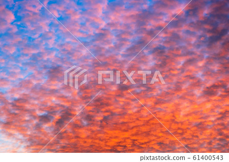 Colorful clouds Cirrocumulus on evening sky. Colorful clouds Cirrocumulus on evening sky. 61400543