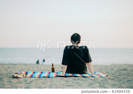 Family enjoying a sea bath 61404339