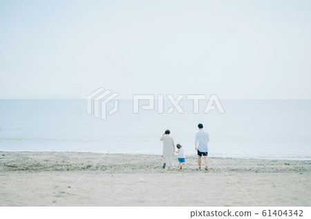 Family enjoying a sea bath Family enjoying a sea bath 61404342