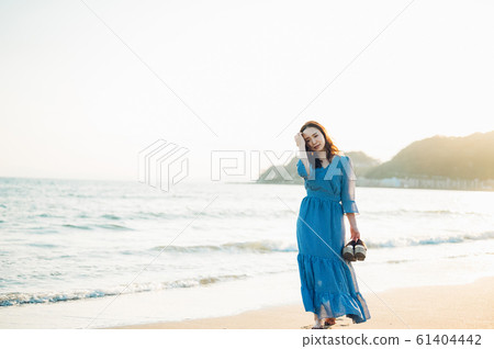 A woman in the sea 61404442