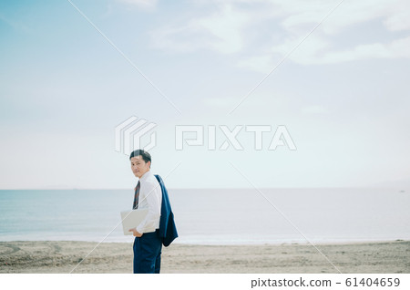 A man working at the sea A man working at the sea 61404659