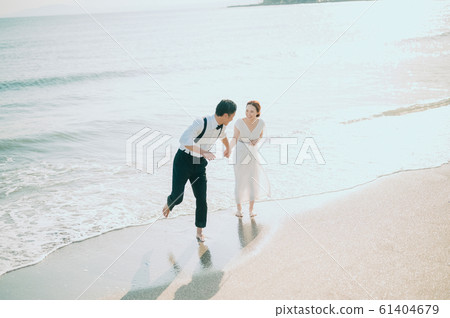 Seaside wedding portrait 61404679