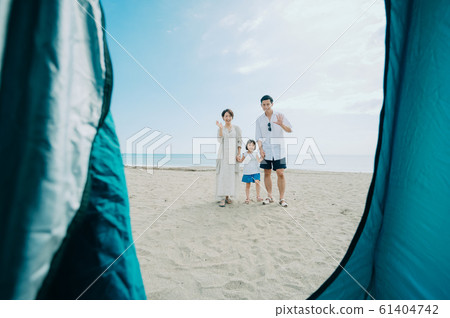 Family enjoying a sea bath Family enjoying a sea bath 61404742