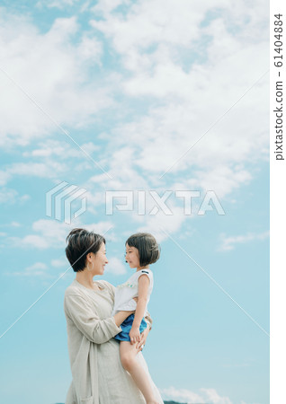 Family enjoying a sea bath 61404884