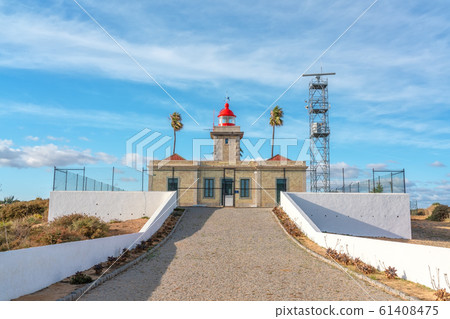 Lighthouse for orienting ships on the cape Ponta de Piedade Lagos, Portugal. 61408475