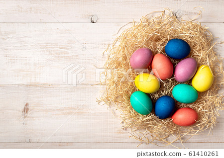 Easter concept, copy space, top view. Colorful eggs Easter concept, copy space, top view. Colorful eggs 61410261