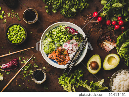 Salmon poke bowl with vegetables, greens, sushi 61415461