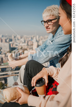 Young couple spending time together on the roof 61415555