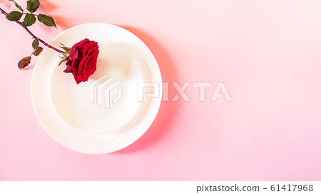 Romantic table setting for Valentines day or dinner date celebration wedding. 61417968