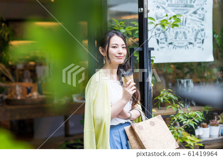 Young woman with shopping Young woman with shopping 61419964
