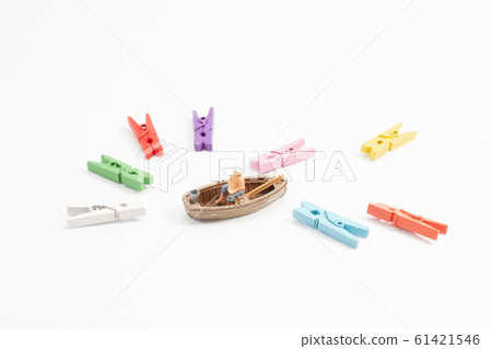 a Figure fisherman catching a fish boat 61421546