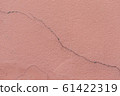 cracked line on  pink wall 61422319