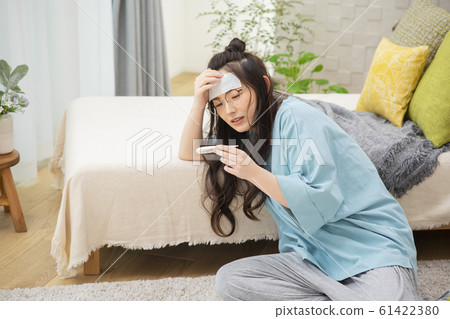 Woman cold fever influenza poor health thermometer Woman cold fever influenza poor health thermometer 61422380