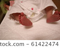 Newborn's foot 61422474