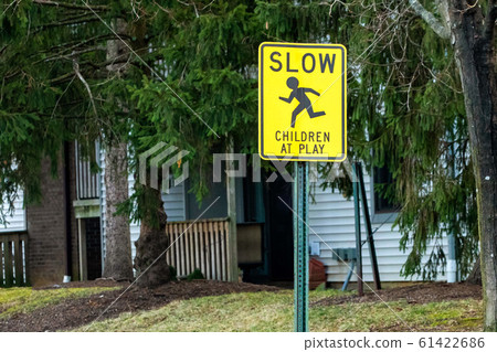 Children at play warning road sign outdoors Children at play warning road sign outdoors 61422686