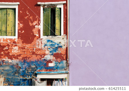 rugged and smooth wall with crack wooden window on colorful cement background rugged and smooth wall with crack wooden window on colorful cement background 61425511