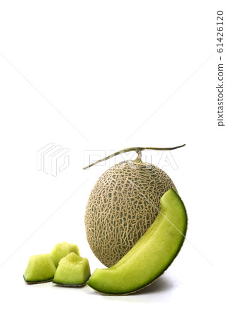 Fresh green melon and slice on white Fresh green melon and slice on white 61426120