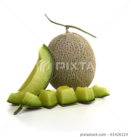 Fresh green melon and slice on white Fresh green melon and slice on white 61426124