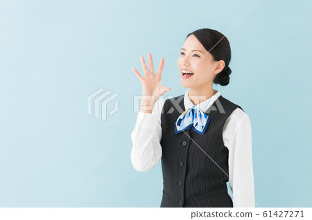 Working woman in uniform (blue background) 61427271