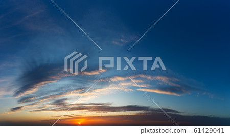 Fantastic clouds at sunrise 61429041