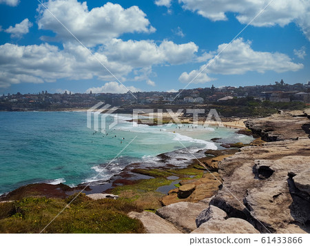 Sunbathers and swimmers on the Tamarama Beach in Sunbathers and swimmers on the Tamarama Beach in 61433866