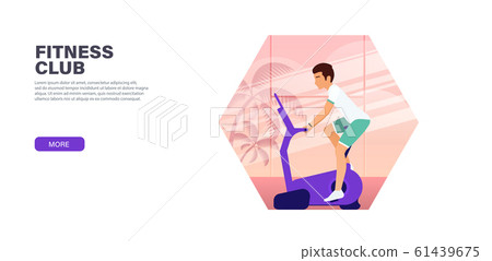 A yang man trains on a stationary bike in a sports club. A yang man trains on a stationary bike in a sports club. 61439675