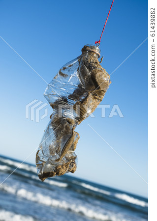 used plastic bottle in a fish hook used plastic bottle in a fish hook 61439882