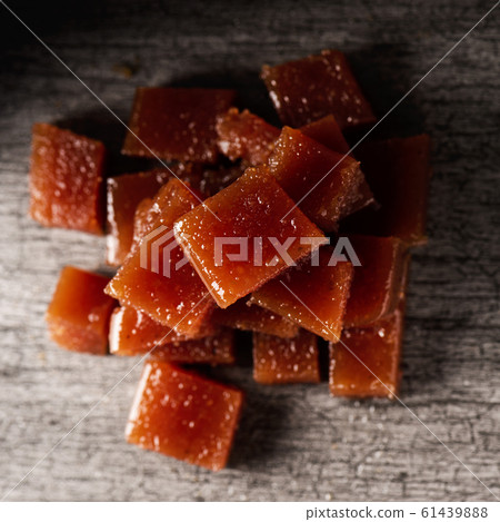 dices of quince cheese on a table dices of quince cheese on a table 61439888