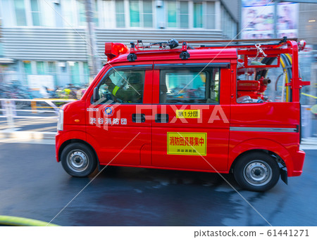 Tokyo cityscape in Japan Fire engine dispatched in a fire (Shibuya fire brigade leaving behind the fire site) = Shibuya, Tokyo Tokyo cityscape in Japan Fire engine dispatched in a fire (Shibuya fire brigade leaving behind the fire site) = Shibuya, Tokyo 61441271