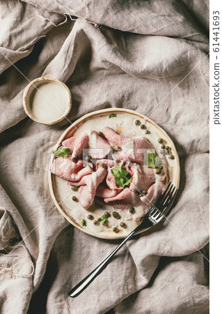 Vitello tonnato sliced veal 61441693