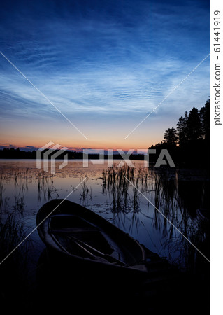 Night shining clouds over lake Night shining clouds over lake 61441919