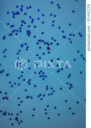 Blue-green-aquamarine background with festive shiny stars. Copy space. Postcard template. Blue-green-aquamarine background with festive shiny stars. Copy space. Postcard template. 61442229