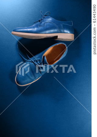 Blue men's leather shoes on dark background Blue men's leather shoes on dark background 61443490