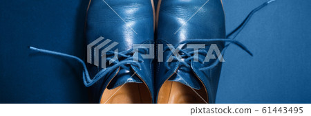 Blue men's leather shoes on dark background Blue men's leather shoes on dark background 61443495