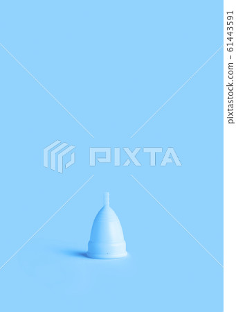 Menstrual cup on pink background. Alternative Menstrual cup on pink background. Alternative 61443591