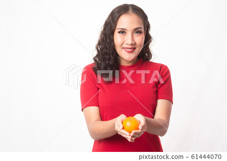 Girl in red dress and Chinese new year 61444070
