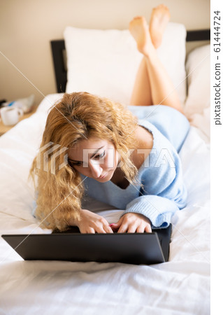 Woman with laptop 61444724