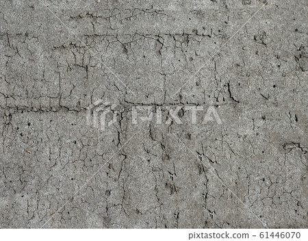 Damaged wall of an abandoned house with peeling plaster and paint Damaged wall of an abandoned house with peeling plaster and paint 61446070