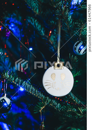 White gingerbread with the symbol of the year rat. White gingerbread with the symbol of the year rat. 61447966